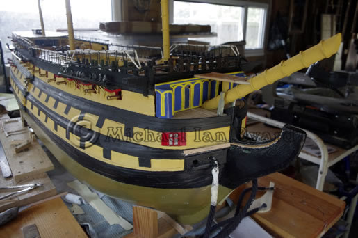 Model showing Port and Starboard Hammock Cranes in situe, awaiting netting and Poop Deck Cranes